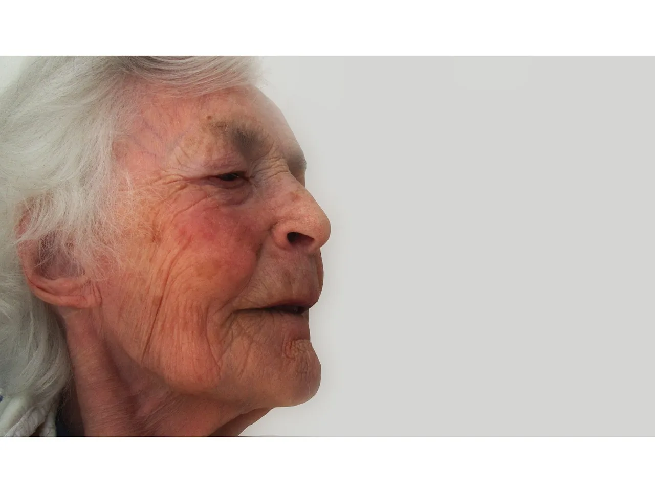 A person with dementia engaging in a home activity with a caregiver.