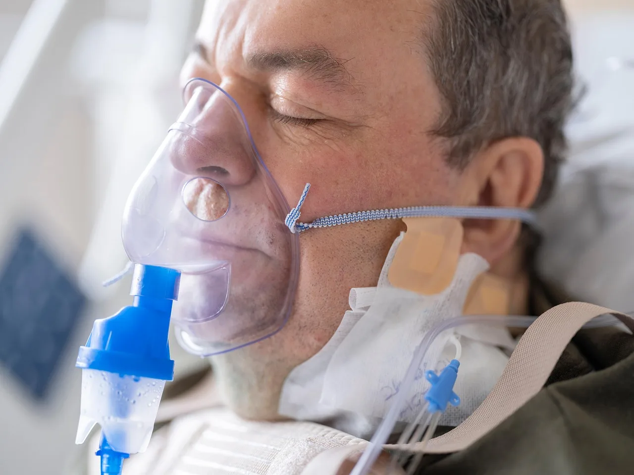 A caregiver monitoring an elderly person's health at home.