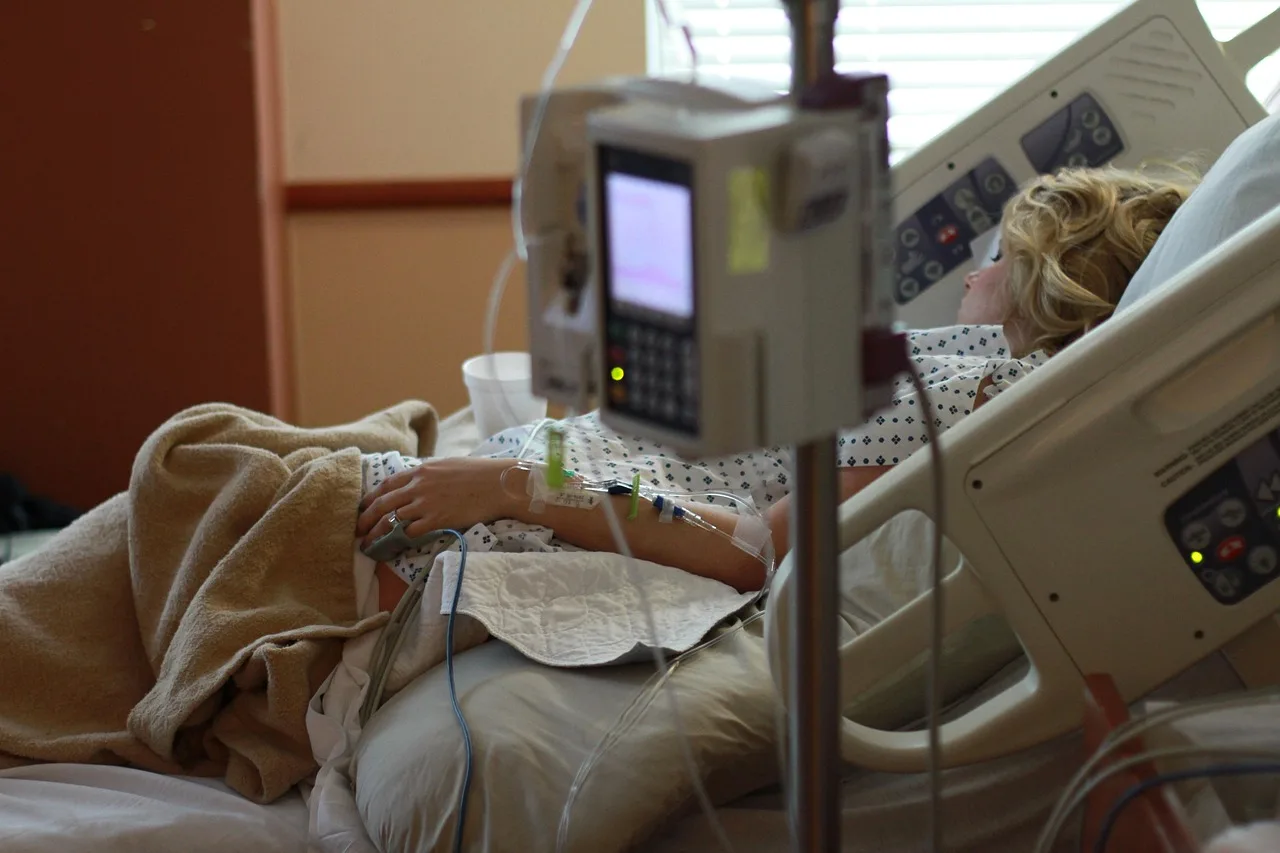 A healthcare professional discussing Medicare coverage with a patient and family.